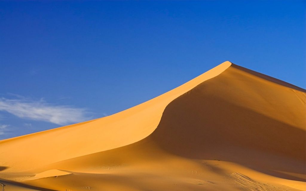Почему не рассыпаются песчаные дюны в пустыне?